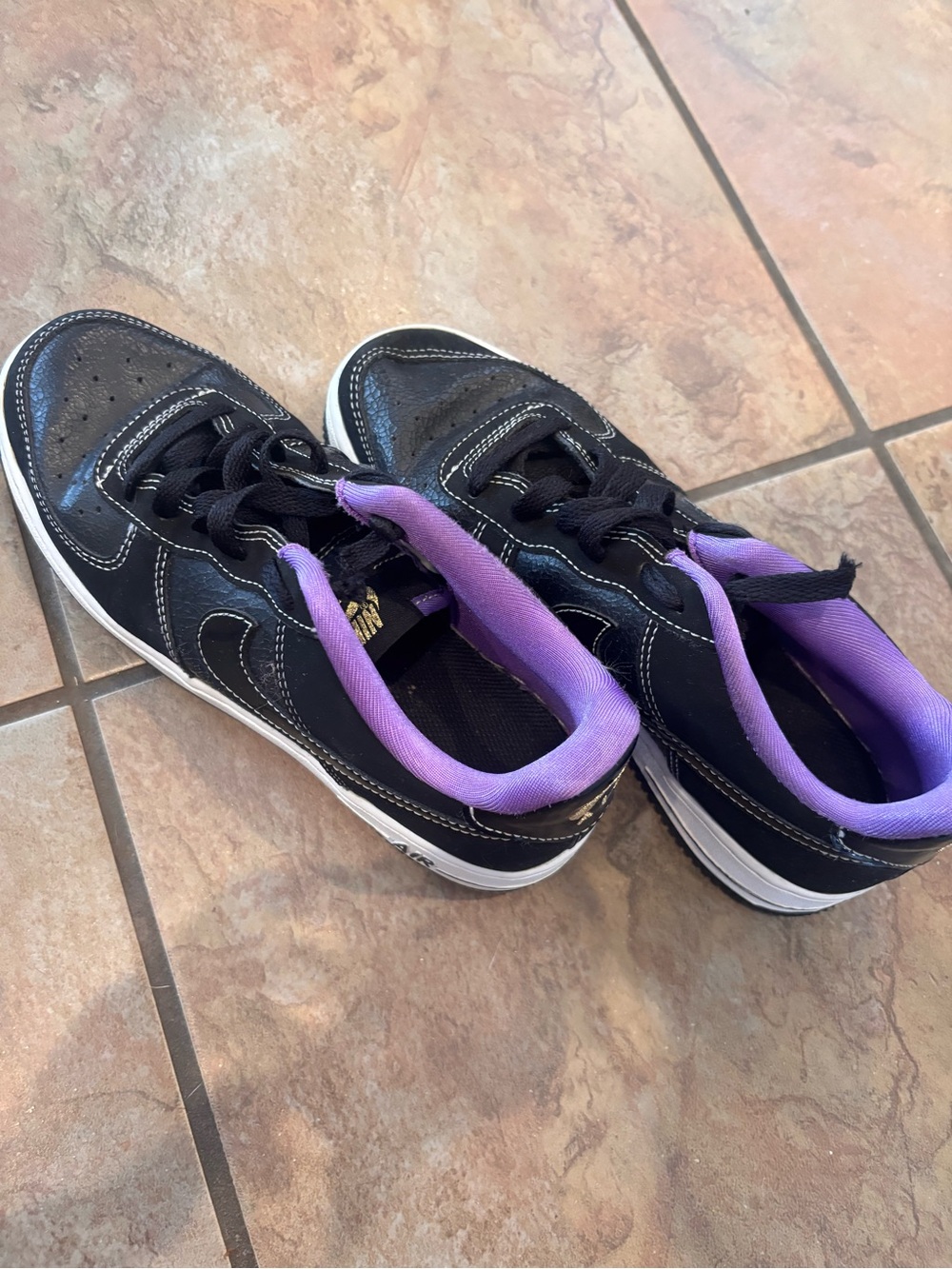 Black Nikes with Purple Lining